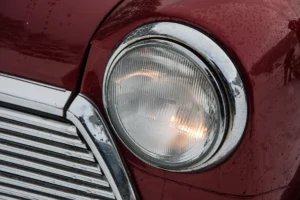 Close up of a MK1 Mini Cooper headlamp