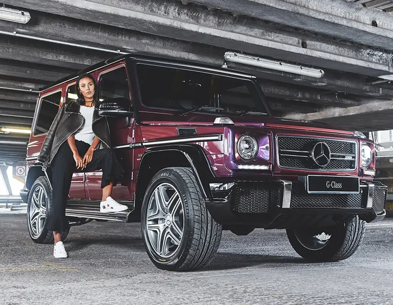 Mercedes G-Class displayed with model during Fashion Week sponsorship