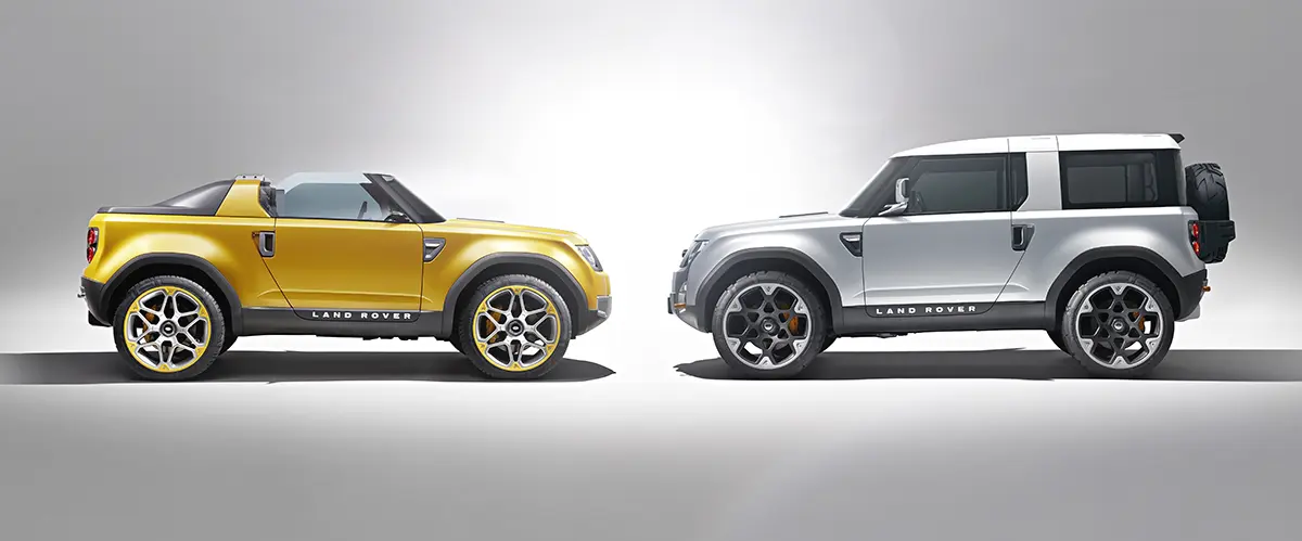 Land Rover DC100 Cabriolet Sport facing a DC100 concept in a photo shoot.