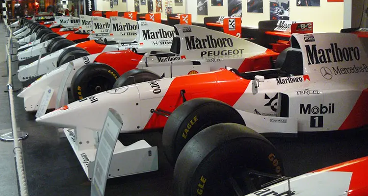 Marlboro Peugeot race cars in paddock