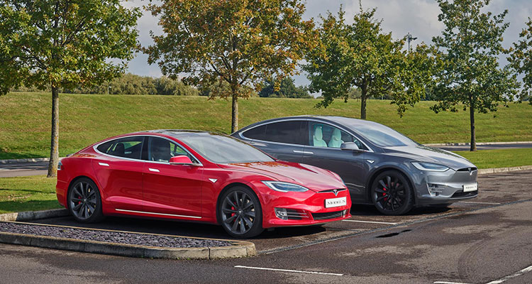 Tesla Model 3 and Model X parked 1