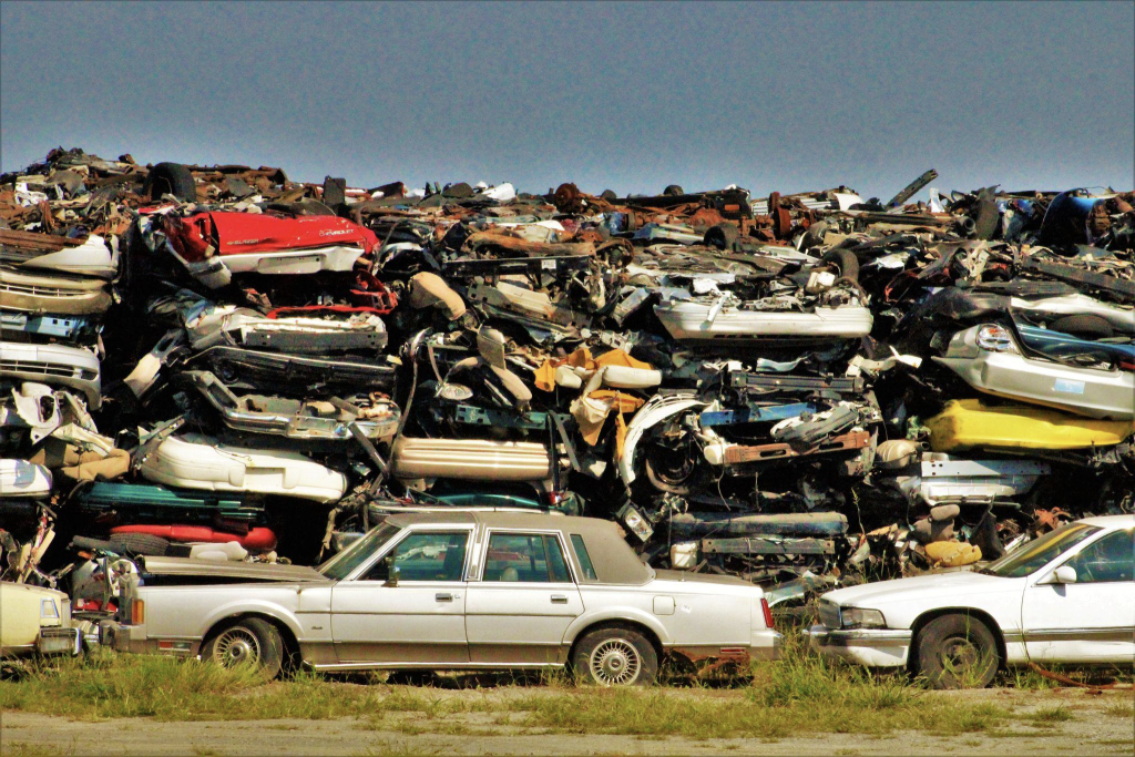 Typical scrapyard heap of old motot cars