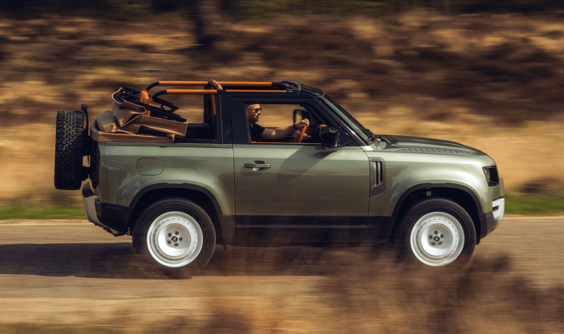 Convertible Land Rover Defender custom made by Heritage Customs