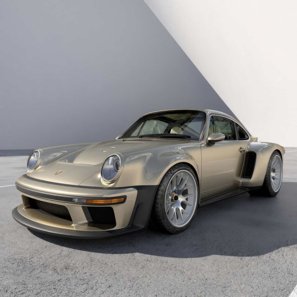 A gold Porsche 911 restored and upgraded by Singer