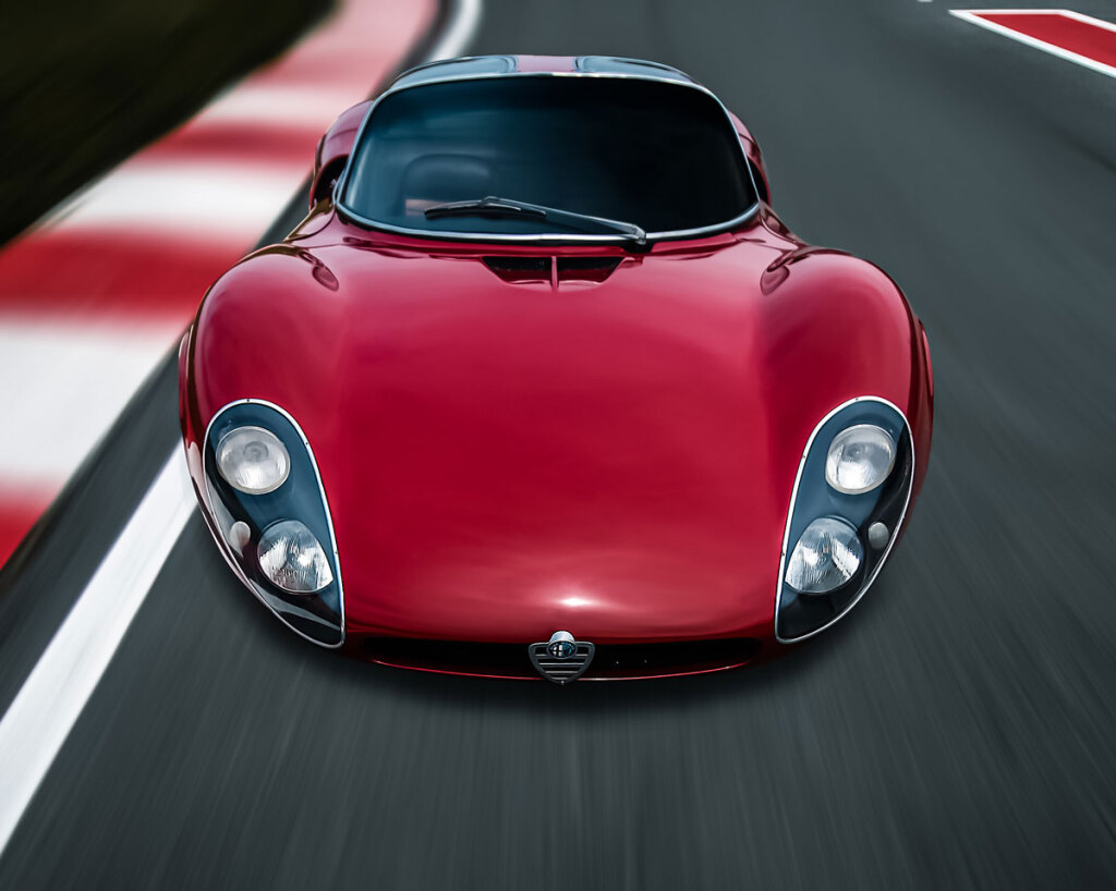 Red Alfa Romeo 33 Stradale on a racetrack