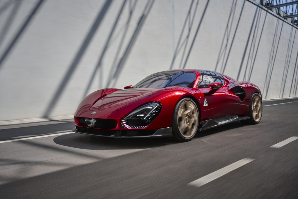 Alfa Romeo 33 Stradale driving on a bridge