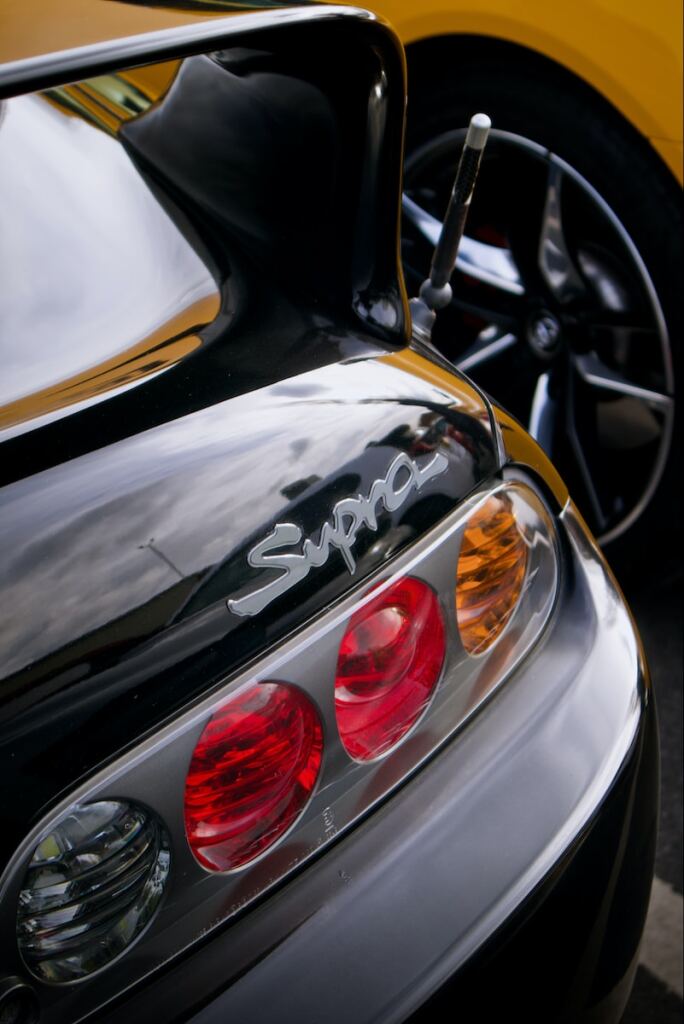 a close up of a Toyota Supra's tail lights