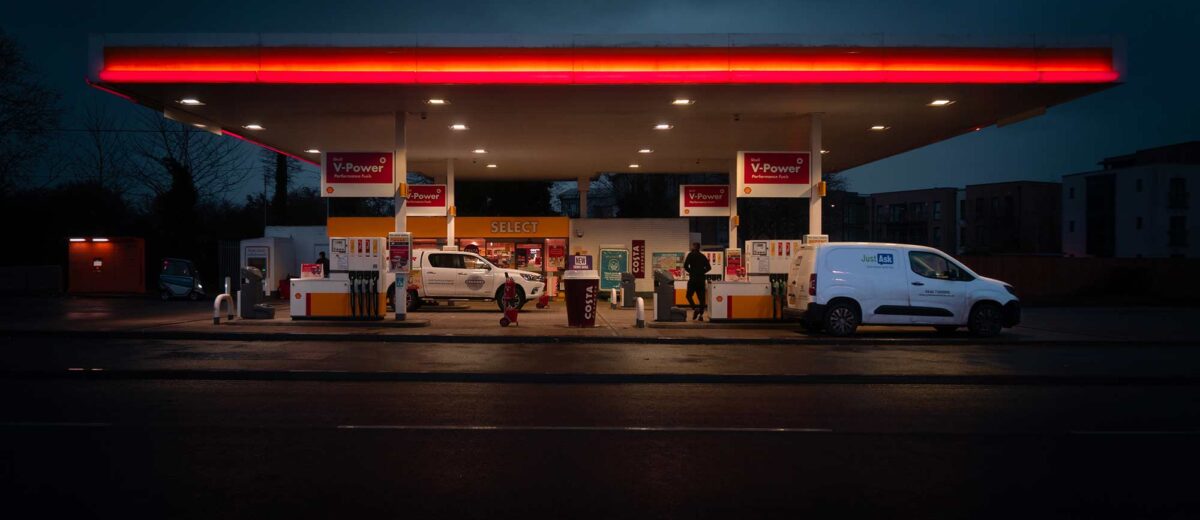 Busy petrol station at night with fuel theft on the rapid increase