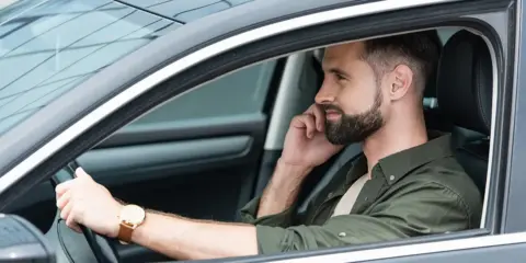 distracted driver on cell phone while driving