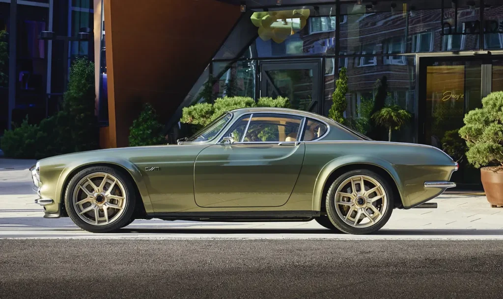 A green Volvo P1800 GT restomod crafted by Cyan GT to celebrate their first World touring car championship in a Volvo