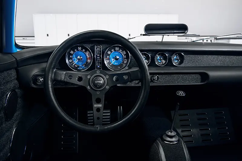 The P1800 Cyan GT dashboard blends 1960 design with modern technology