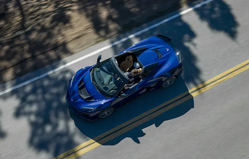 A blue ZR1 Corvette on country roads