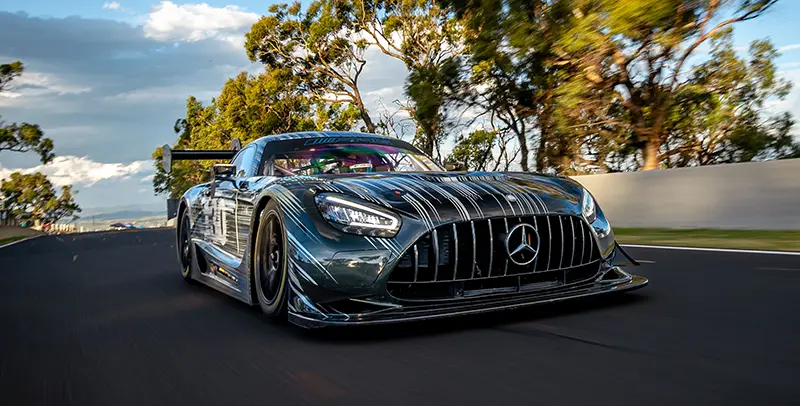 On the road, a Mercedes AMG GT Edition 130Y