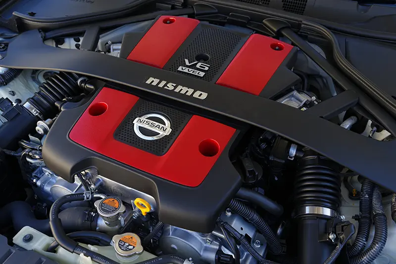 Nissan 370Z Nismo V6 engine, high-performance engineering producing 350 horsepower.