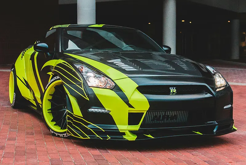 customised Nissan GTR under a bridge