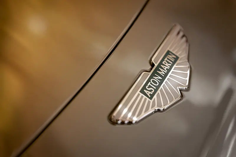 Enamelled script badges on the Aston Martin DB12 Goldfinger Edition.