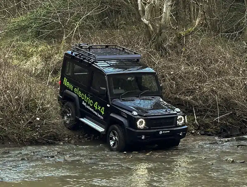 Spartan EV 2.0 crossing a stream