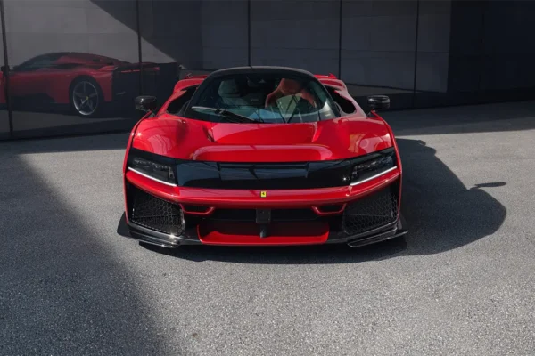 Front view of Ferrari F80 hypercar with sleek aerodynamic design and aggressive stance.