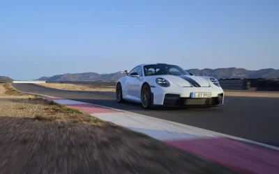 White 2024 Porsche 911 GT with Weissach Package featuring carbon-fiber components on race track testing day