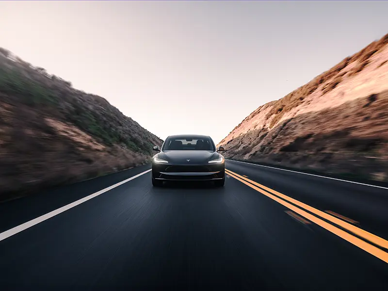 Tesla Model 3 Long Range electric car driving in the UK