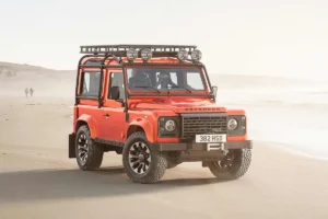 Front view of the Custom Retro Classic Defender V8, showcasing the iconic boxy design with modern LED headlights and a Heritage grille.