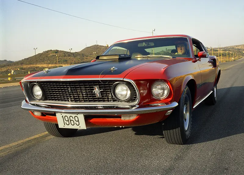 1969 Ford Mustang GT Eleanor in red, iconic from Gone in 60 Seconds