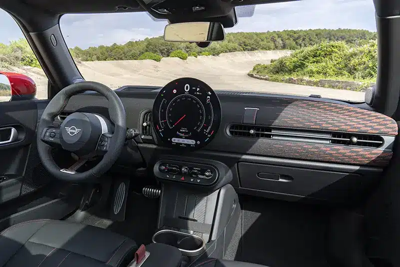 Interior of Mini John Cooper Works Hatchback featuring premium seating and advanced technology.