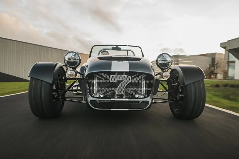 Front street-level view of the Caterham Seven CSR Twenty on a test track.