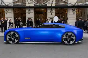 Jaguar Type 00 electric concept car parked outside French Ultramarine building.