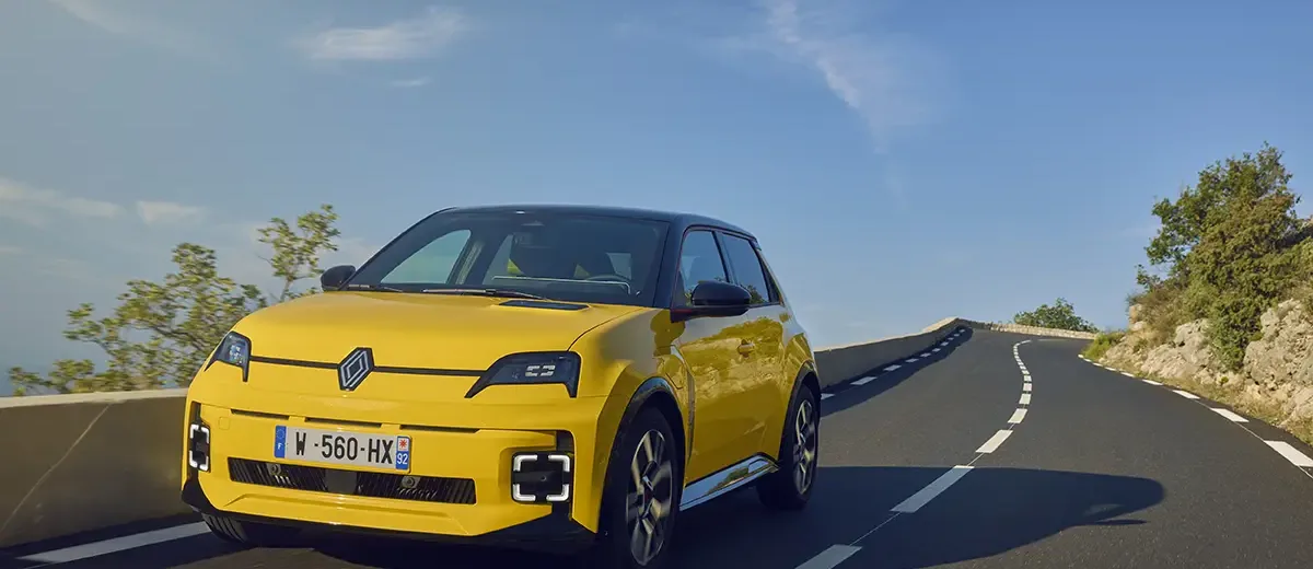 New Renault 5 E-Tech EV Hatchback driving along a winding mountain road