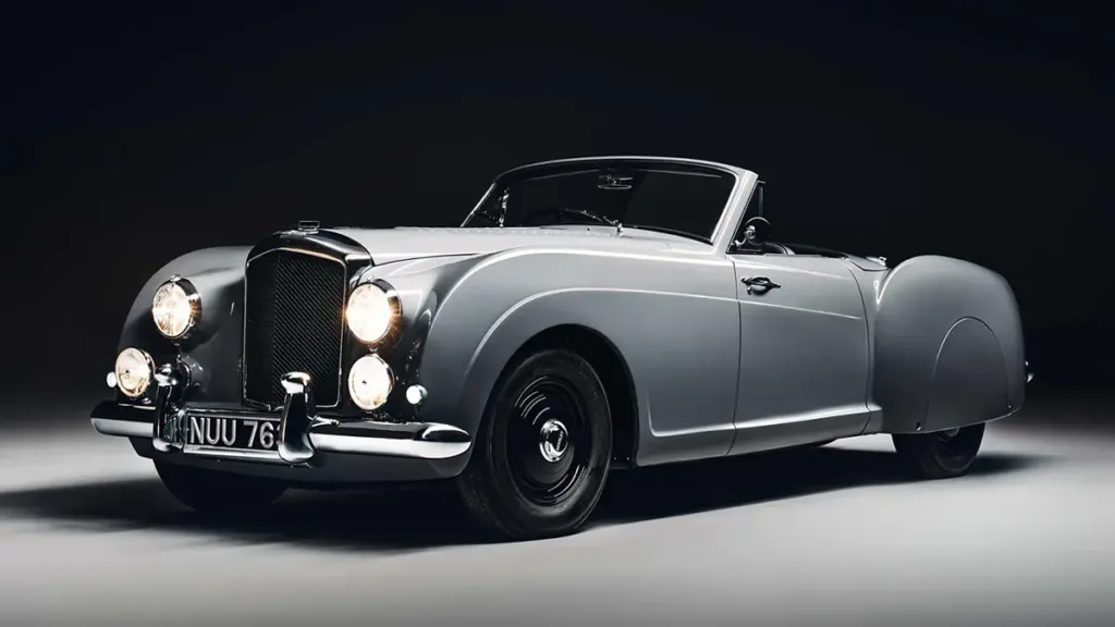 Front three-quarter view of the James Bond Bentley Locomotive in battleship grey