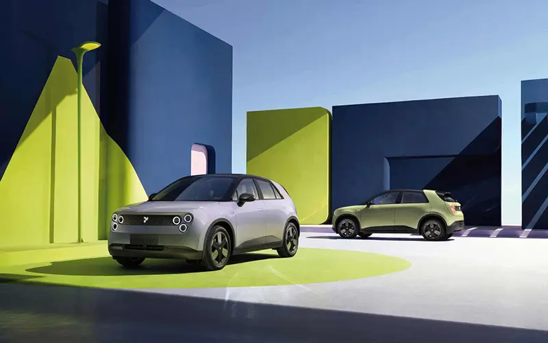 Two Nio Firefly UK electric cars parked side by side in studio setting