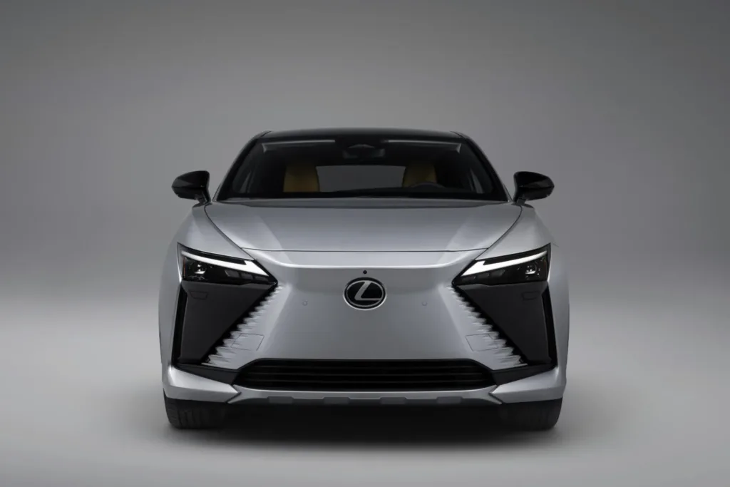 Front view of the Lexus RZ 600e F Sport Performance electric SUV in silver studio lighting