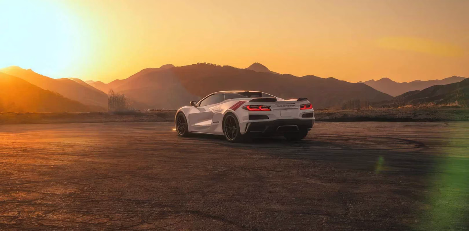 White 2027 Chevrolet Corvette Grand Sport viewed from the rear at sunset in the mountains