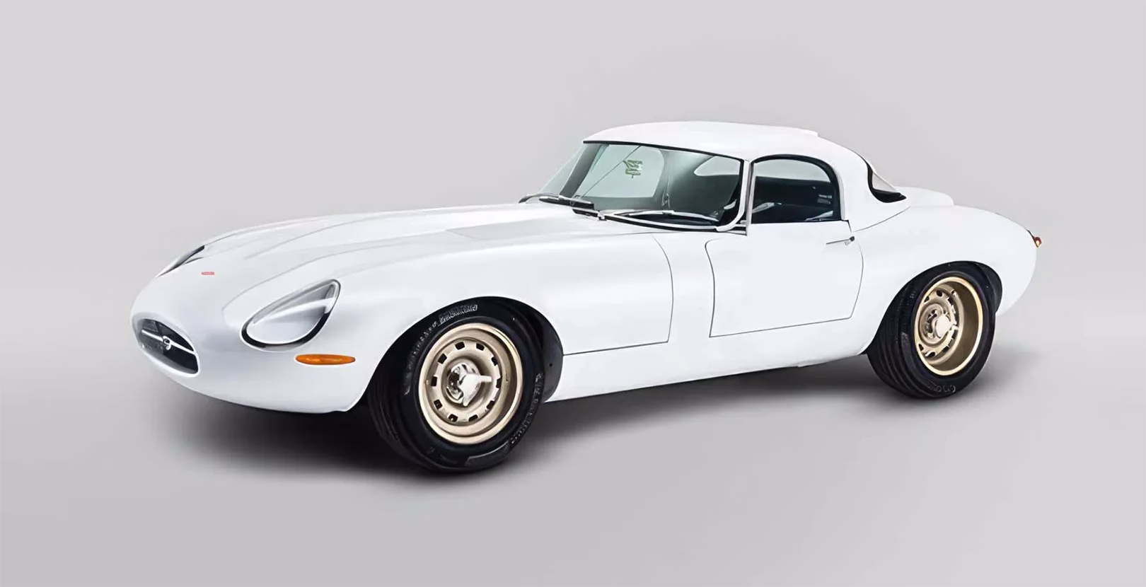 White Eagle Lightweight GTR Jaguar E-Type front three quarter view in a studio