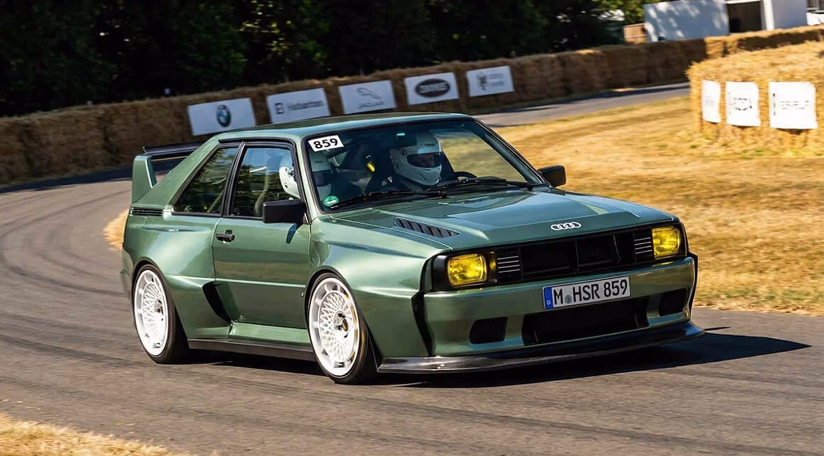 Green HSR Type 859 Audi Sport Quattro restomod cornering at the Goodwood hillclimb